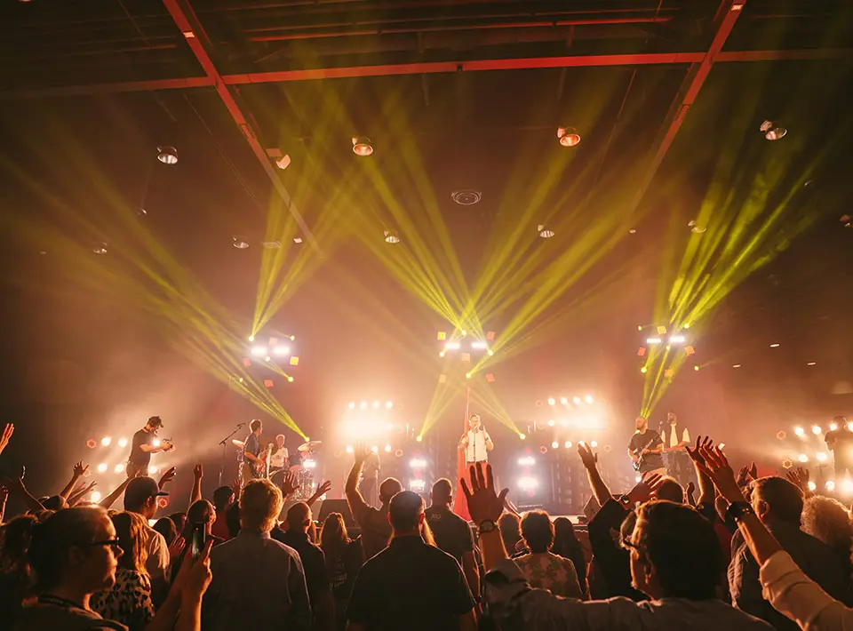 A crowd of people in the middle of an event.